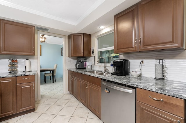 kitchen featuring tasteful backsplash, dishwasher, sink, dark stone countertops, and crown molding