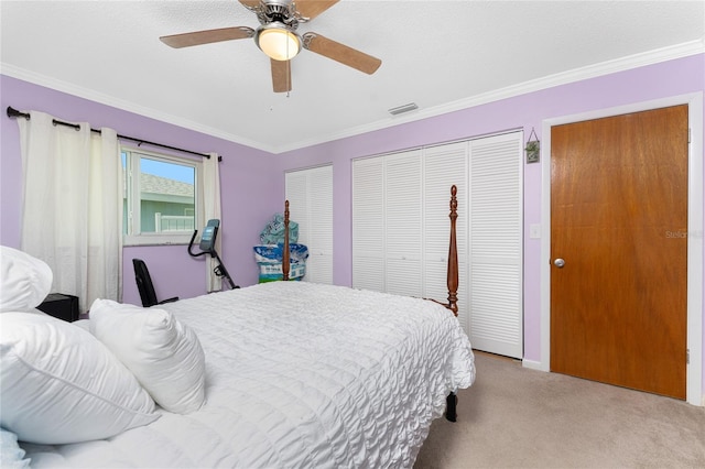 bedroom featuring ornamental molding, light carpet, and ceiling fan