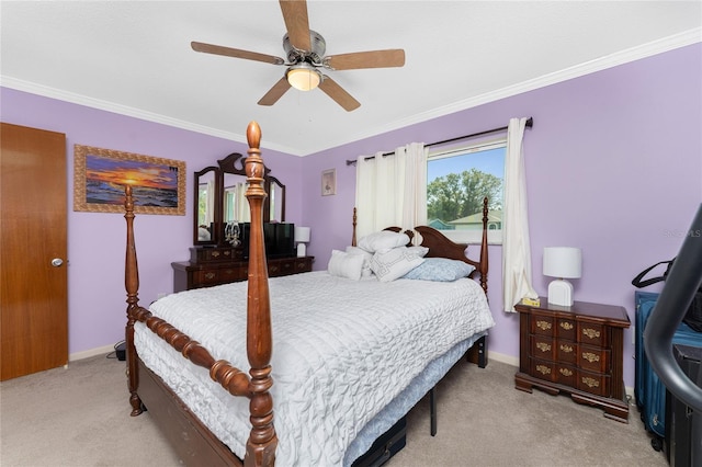 bedroom featuring ornamental molding, light carpet, and ceiling fan