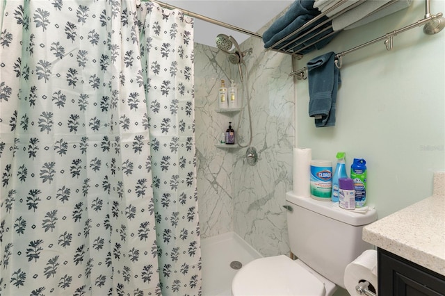 bathroom featuring vanity, toilet, and a shower with shower curtain