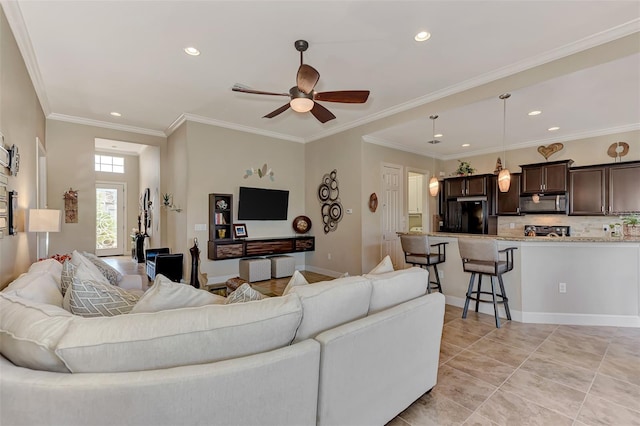 tiled living room with crown molding and ceiling fan