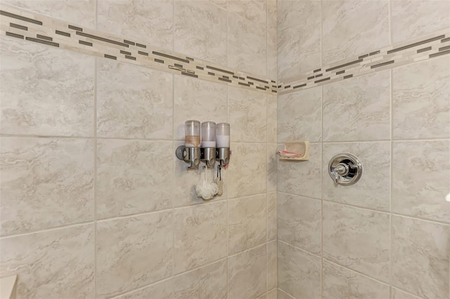 details with a tile shower