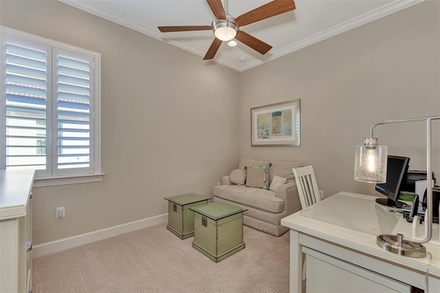 carpeted office space featuring ceiling fan, a healthy amount of sunlight, and ornamental molding