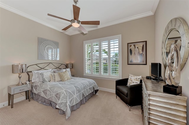 bedroom featuring ceiling fan, ornamental molding, and light colored carpet