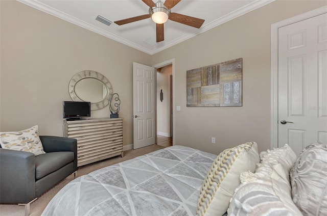 bedroom with crown molding and ceiling fan