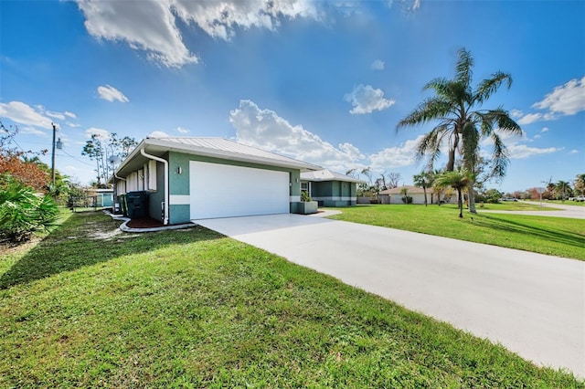 ranch-style house with a front lawn and a garage