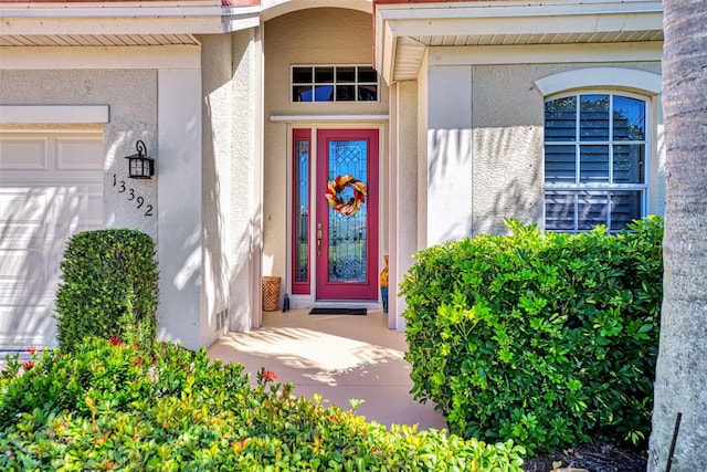 entrance to property with a garage