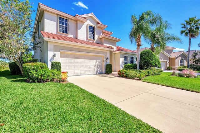 view of front facade featuring a front yard and a garage