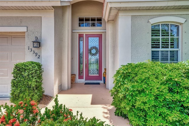 entrance to property with a garage