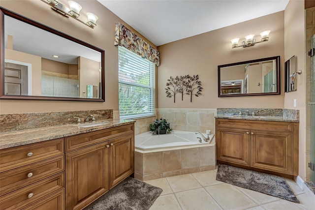 bathroom featuring vanity, separate shower and tub, and tile patterned flooring