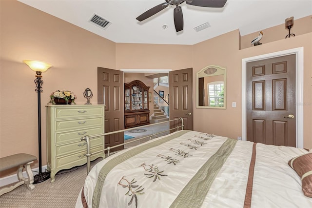 bedroom featuring carpet and ceiling fan