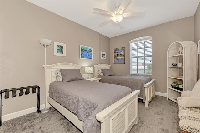 bedroom featuring ceiling fan and light colored carpet