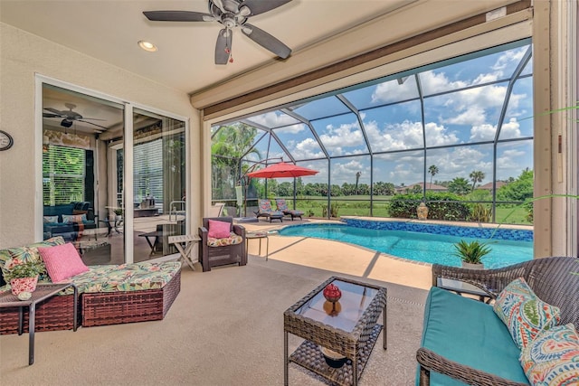 view of pool featuring a patio area, an outdoor living space, a lanai, and ceiling fan