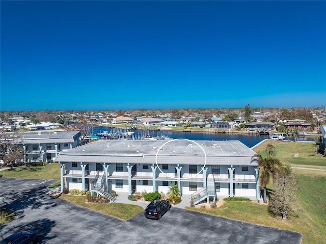 bird's eye view with a water view