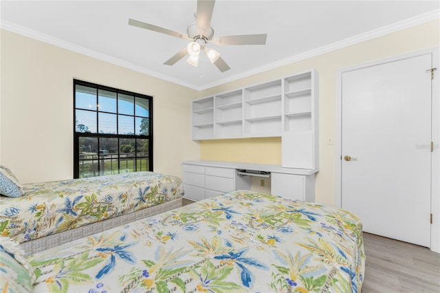 bedroom with light hardwood / wood-style floors, crown molding, and ceiling fan