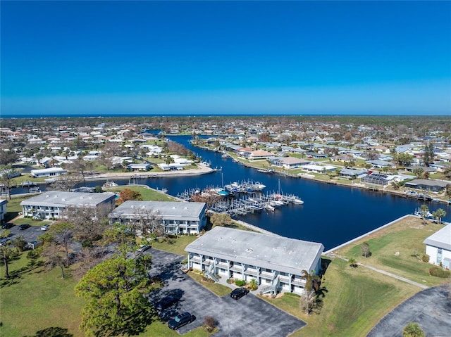 drone / aerial view featuring a water view