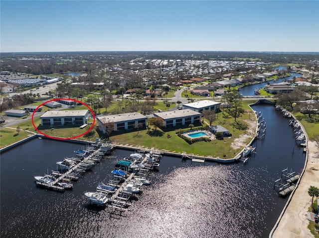 drone / aerial view with a water view