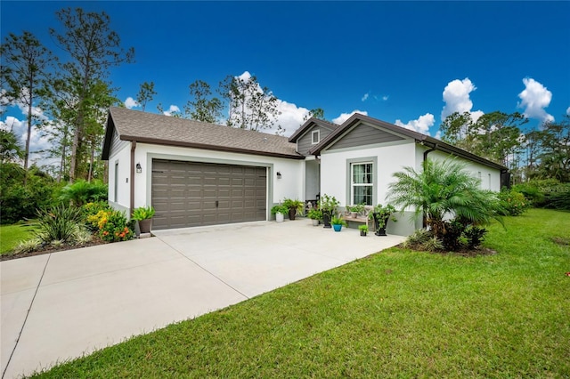 single story home with a garage and a front lawn