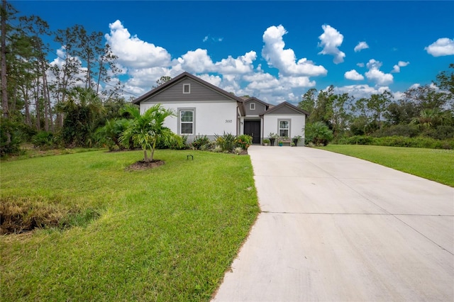 single story home with a front yard