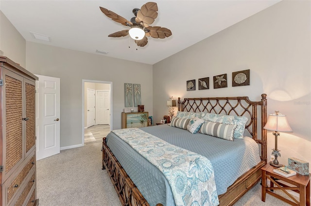 bedroom featuring ceiling fan and light carpet