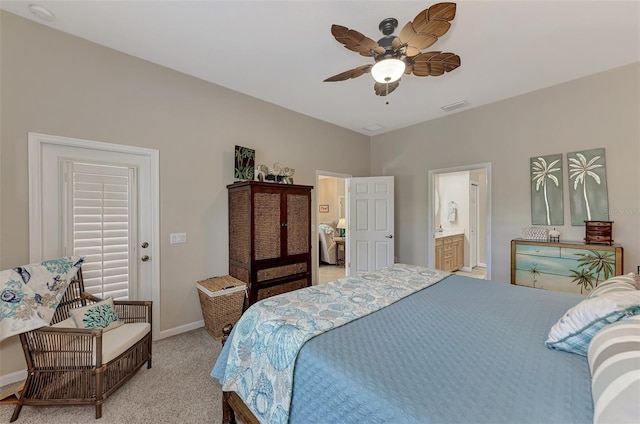 carpeted bedroom with connected bathroom and ceiling fan