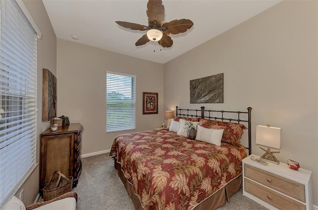 bedroom with light colored carpet and ceiling fan