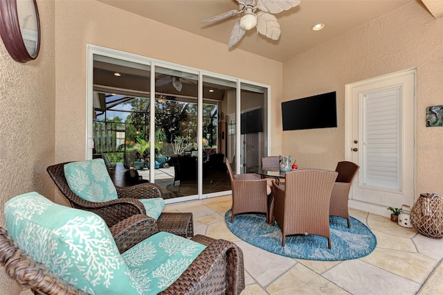 view of patio / terrace featuring ceiling fan