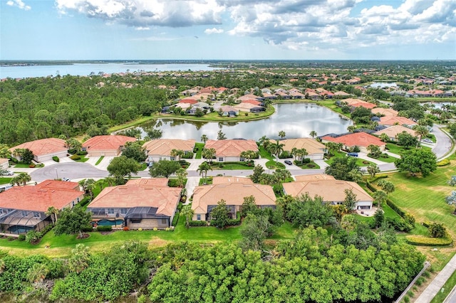 drone / aerial view with a water view