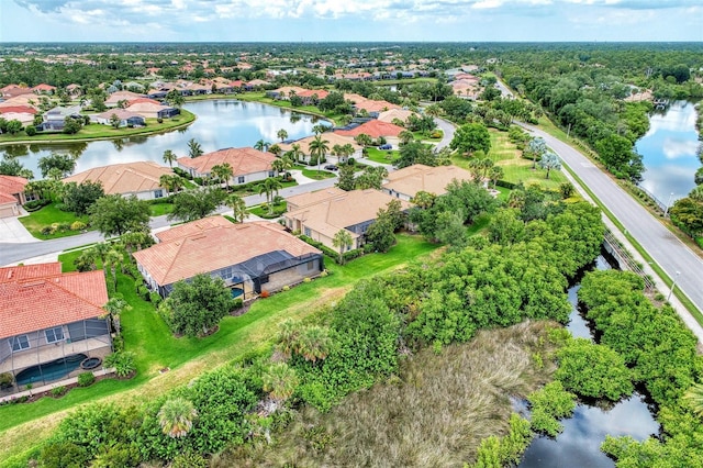 aerial view with a water view and a residential view