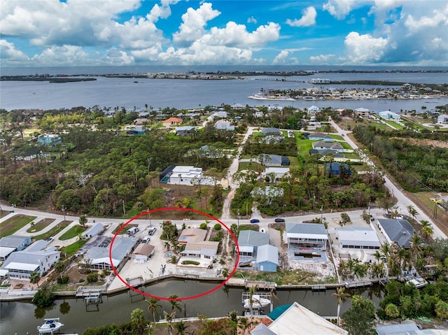 bird's eye view with a water view