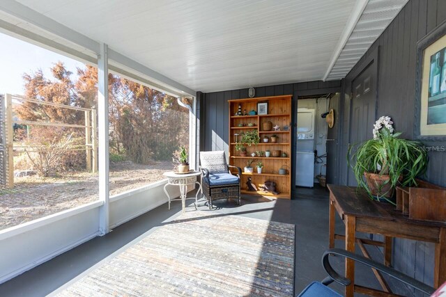 sunroom / solarium featuring plenty of natural light