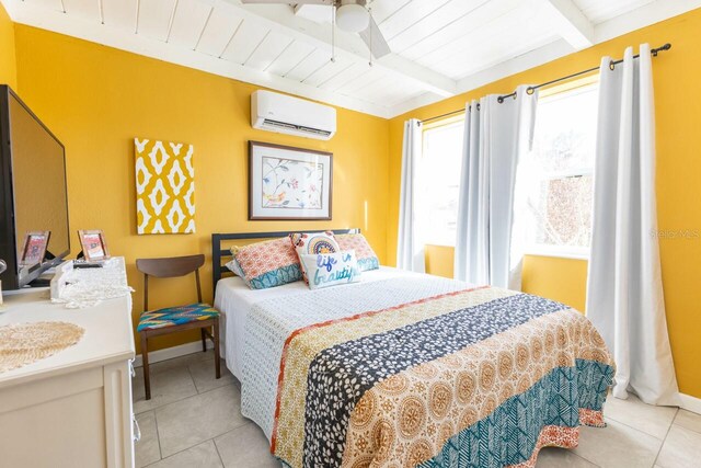 bedroom featuring wood ceiling, a wall unit AC, beam ceiling, light tile patterned floors, and ceiling fan