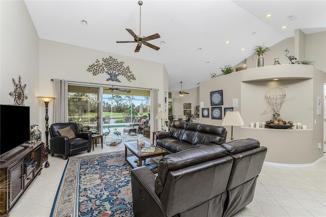 living room featuring ceiling fan, high vaulted ceiling, and light tile patterned floors