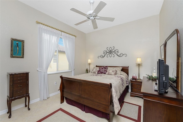 bedroom featuring ceiling fan and light tile patterned floors