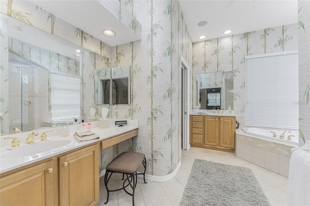 bathroom with vanity, plus walk in shower, and tile patterned floors