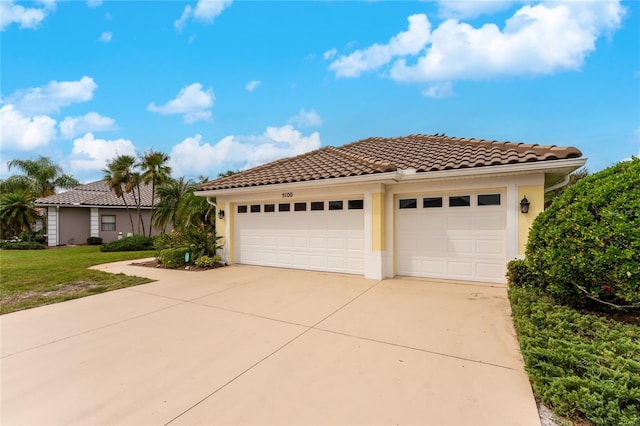 mediterranean / spanish-style house featuring a garage