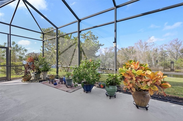 view of patio / terrace with a lanai