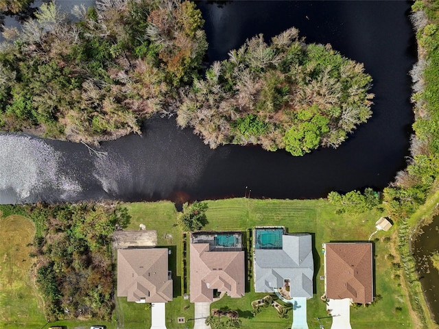 birds eye view of property featuring a water view