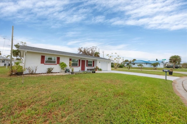 single story home featuring a front yard