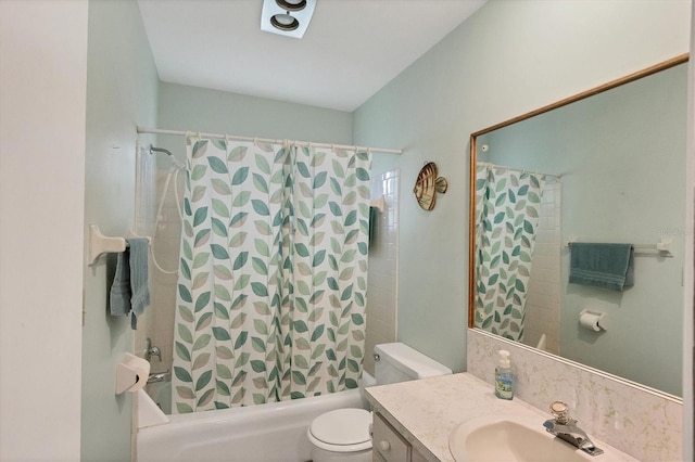 full bathroom with vanity, toilet, and shower / tub combo with curtain