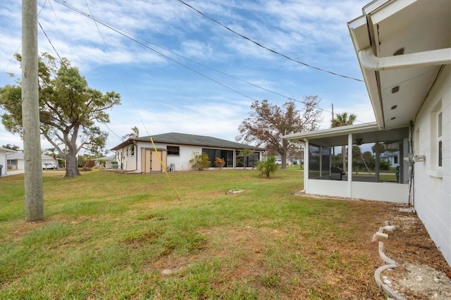 view of yard featuring a sunroom