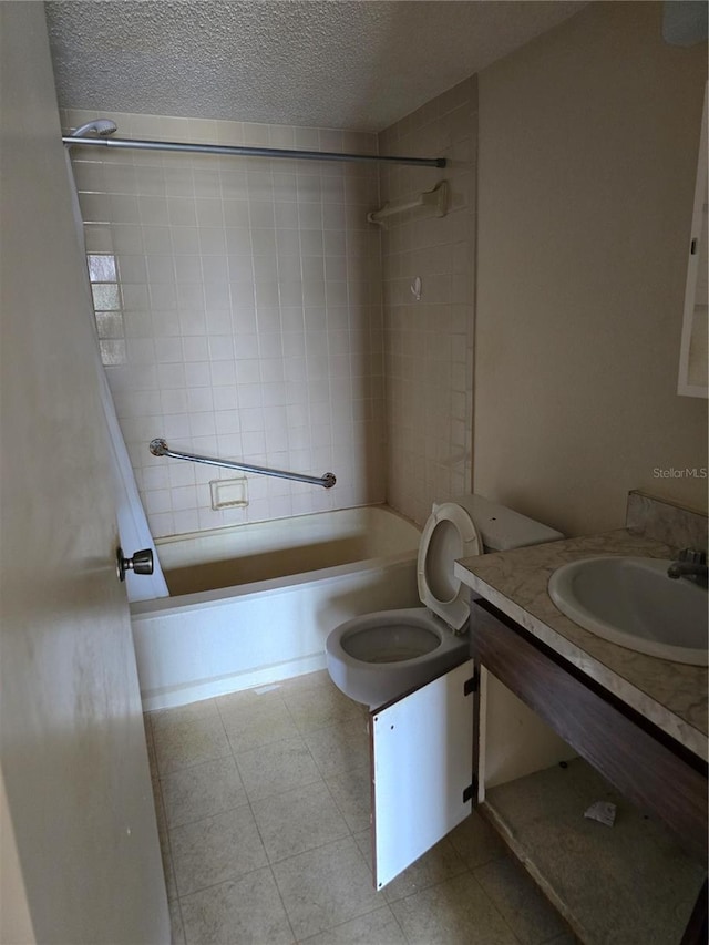 2300 Aaron St Unit 315, Port Charlotte, FL 33952 - bathroom with vanity, shower / bathtub combination, toilet, and a textured ceiling