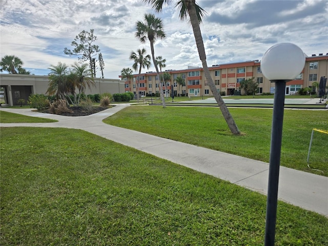 2300 Aaron St Unit 315, Port Charlotte, FL 33952 - view of property's community with a lawn