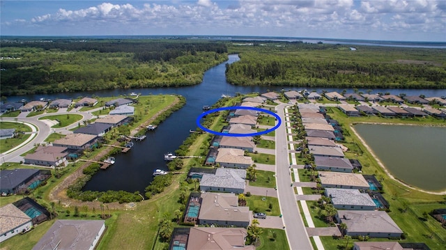 drone / aerial view featuring a water view