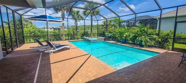 view of swimming pool featuring an in ground hot tub, a lanai, and a patio area