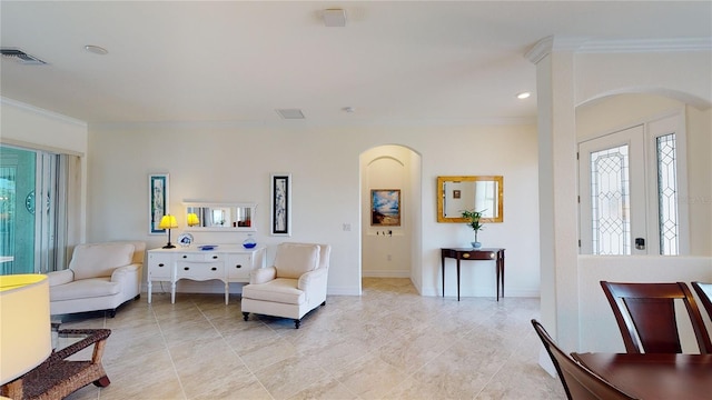 sitting room with ornamental molding