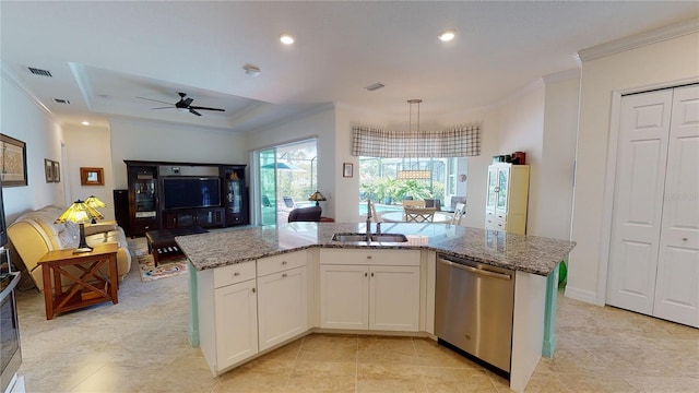 kitchen with sink, dishwasher, light stone countertops, an island with sink, and white cabinets