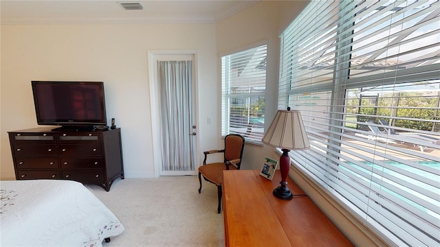 carpeted bedroom with ornamental molding