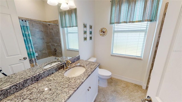 full bathroom with vanity, shower / tub combo with curtain, tile patterned floors, and toilet