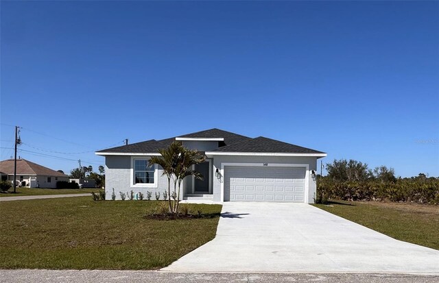 148 Lime Tree Park, Rotonda West, FL 33947 - ranch-style home featuring stucco siding, an attached garage, concrete driveway, and a front lawn